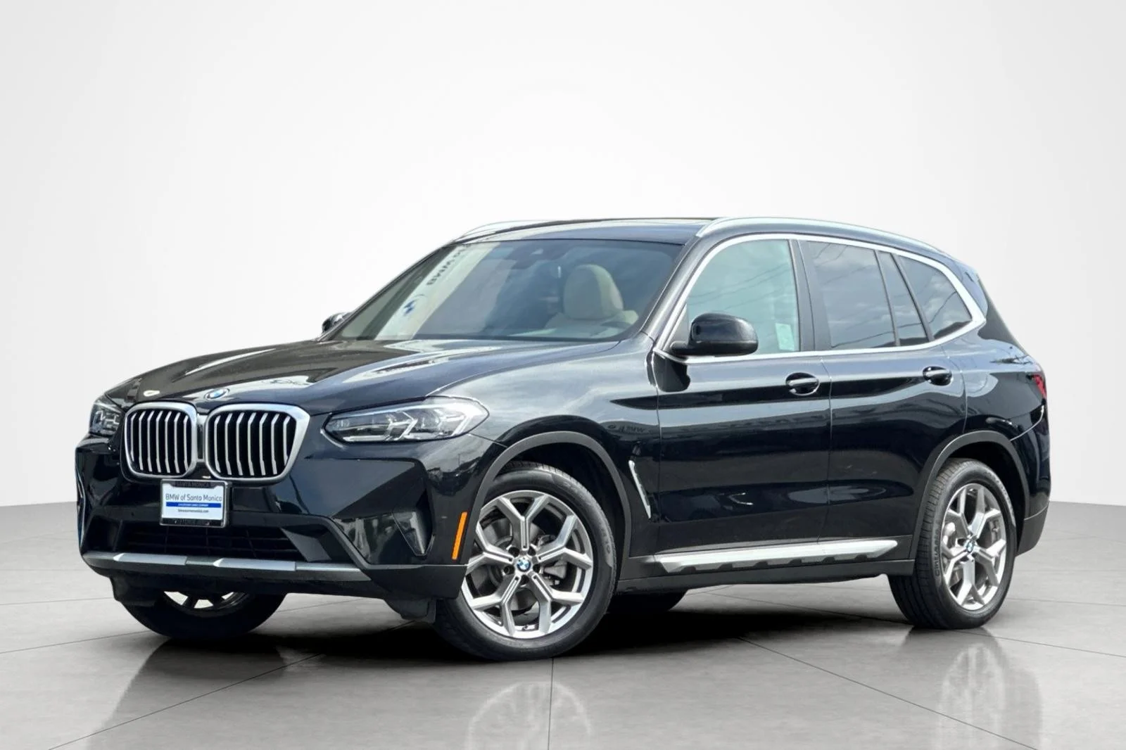 Used 2023 Black Sapphire Metallic BMW sDrive30i image 1