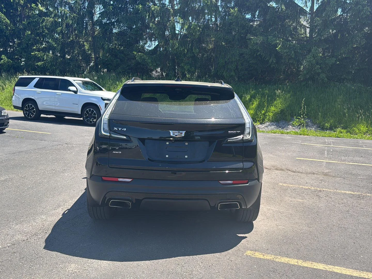 Used 2022 Stellar Black Metallic Cadillac AWD Sport image 4