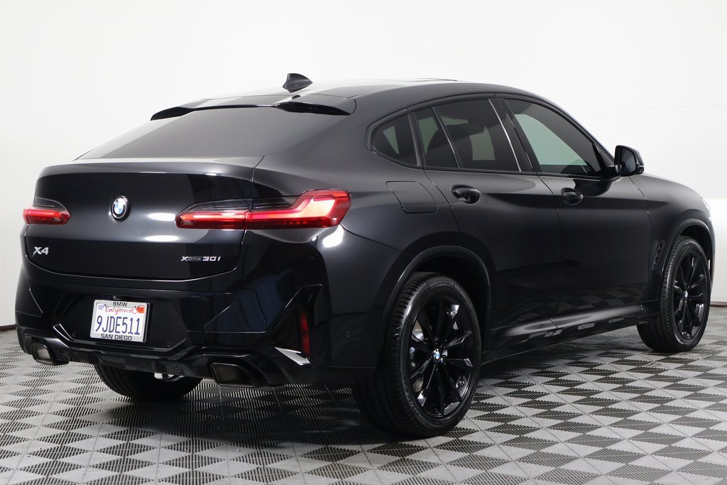 Used 2024 Black Sapphire Metallic BMW xDrive30i image 4
