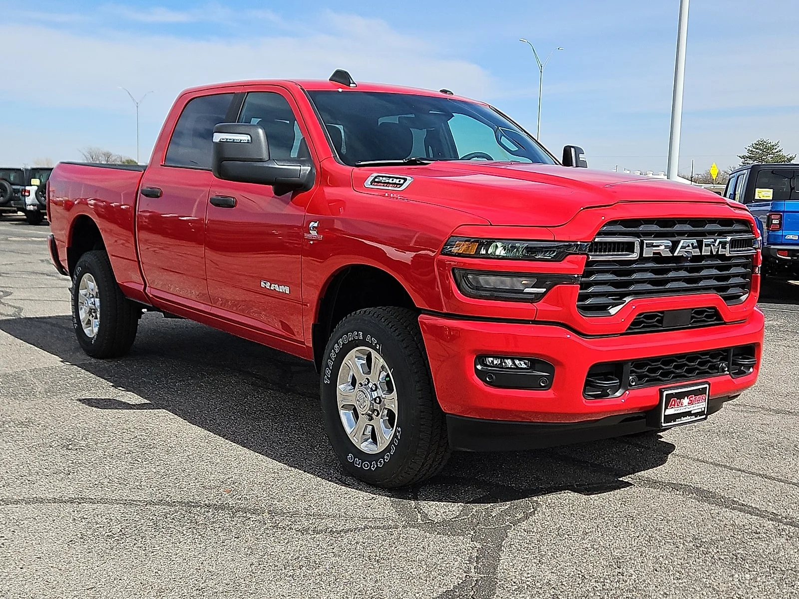 New 2026 Flame Red Ram LONE STAR CREW CAB 4X4 6