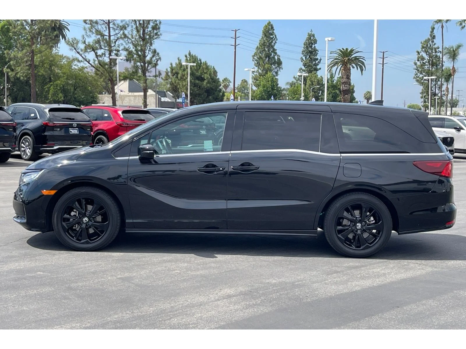 Certified Used 2023 Crystal Black Pearl Honda SPORT image 2