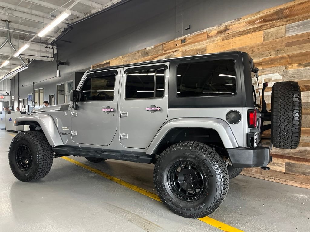 Used 2014 Billet Metallic Clearcoat Jeep Unlimited Sahara image 19