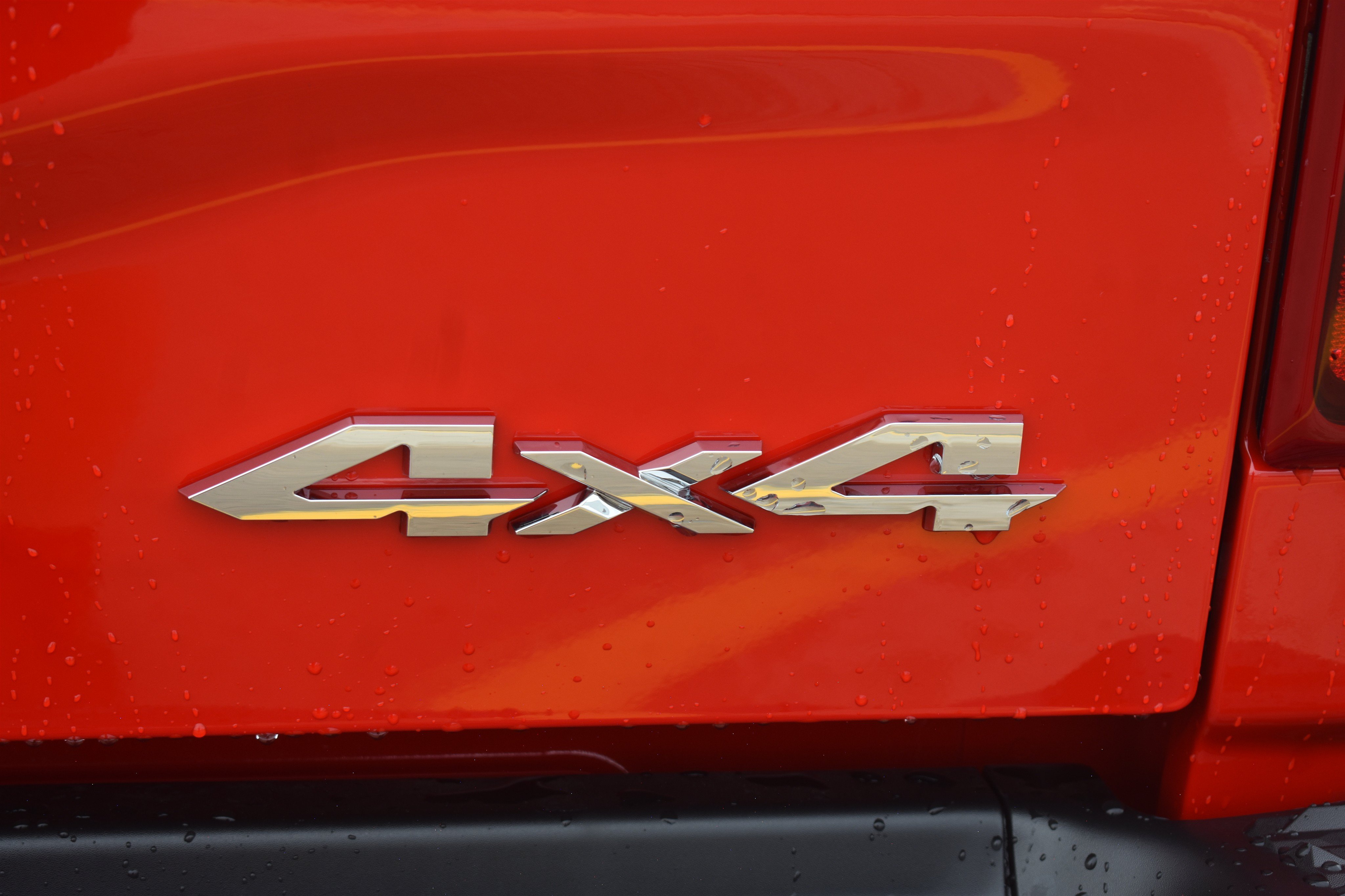 New 2026 Flame Red Clear-Coat Exterior Paint RAM Laramie image 8