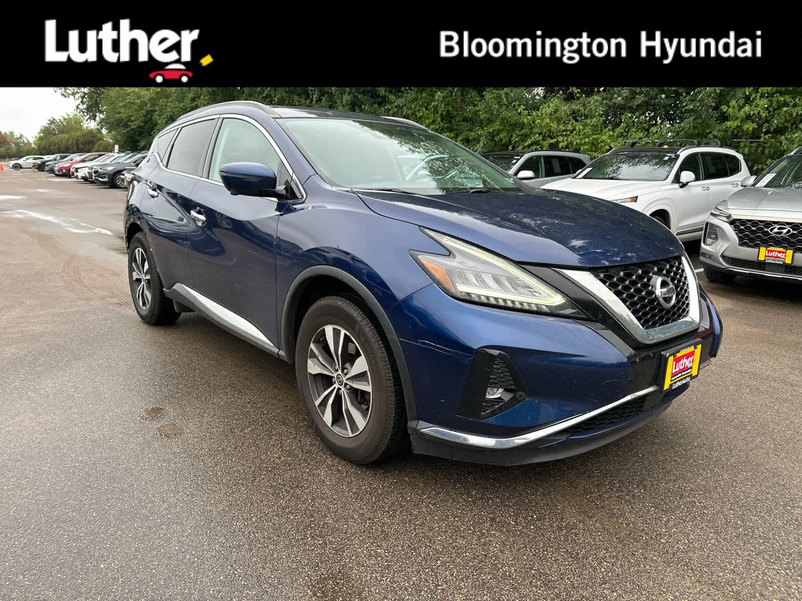 Used 2020 Deep Blue Pearl Nissan SV image 1