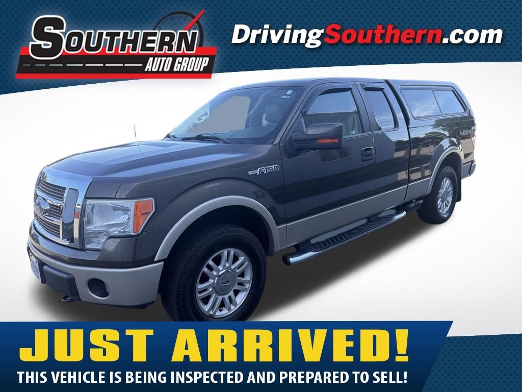 Used 2009 Brown Ford Lariat image 1