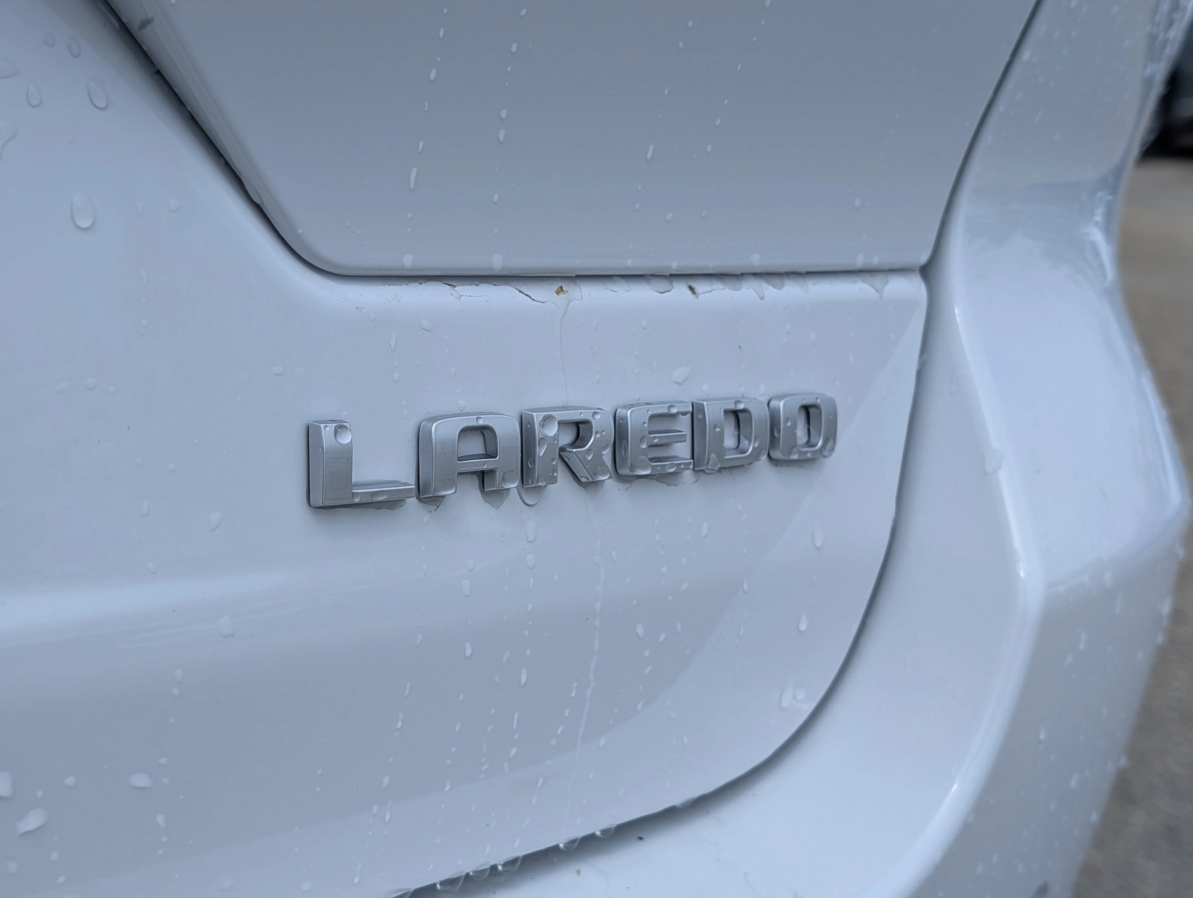 New 2026 Bright White Jeep Laredo image 14