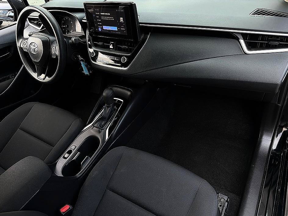Used 2025 Midnight Black Metallic Toyota LE image 24