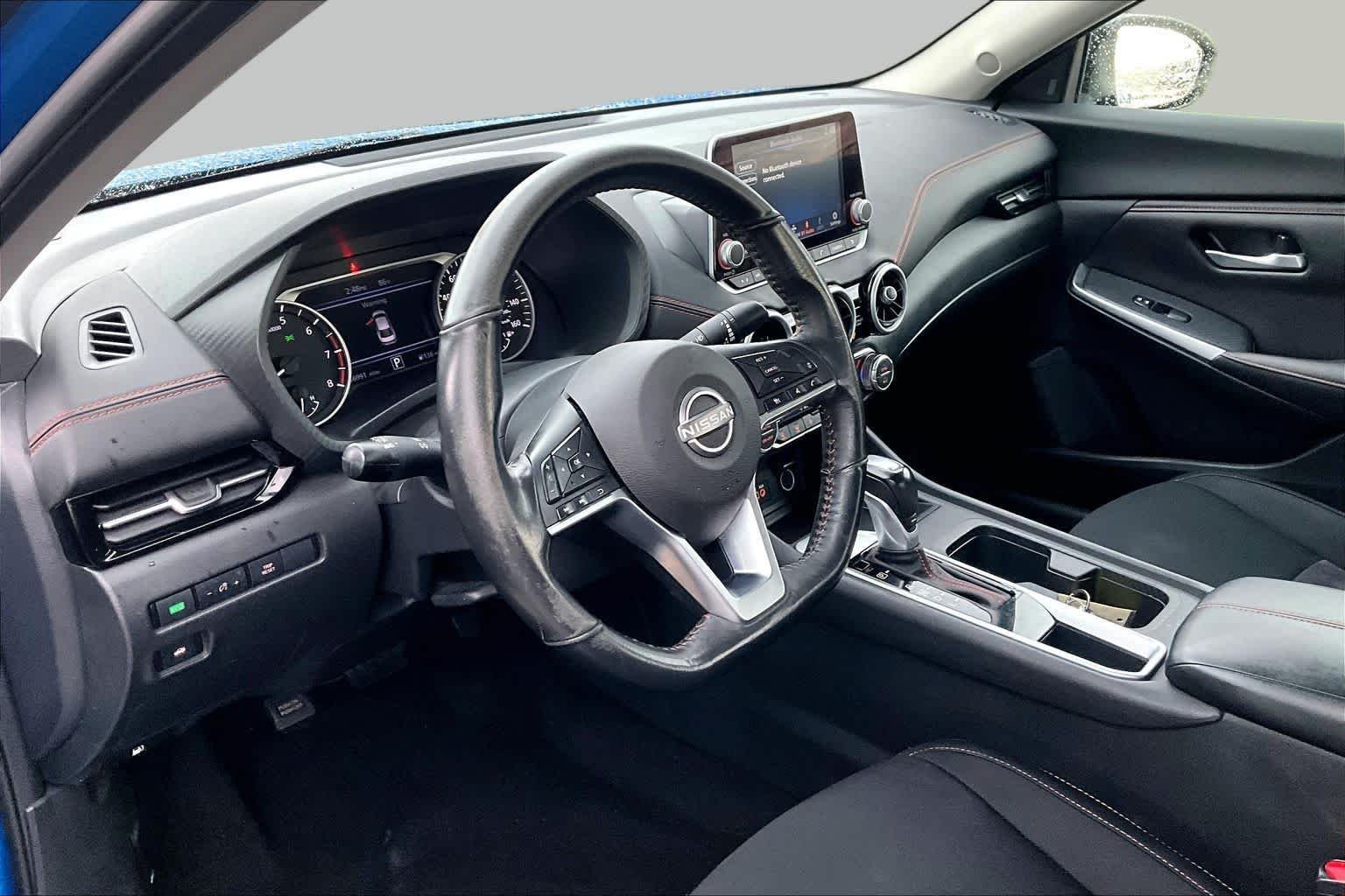 Used 2024 Electric Blue Metallic/Super Black Nissan SR image 18