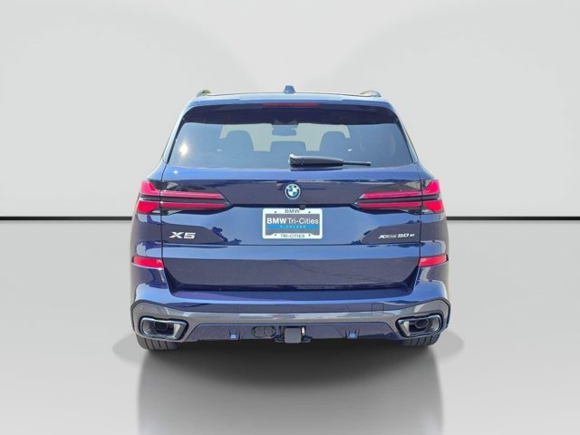New 2026 Tanzanite Blue II Metallic BMW xDrive50e image 5