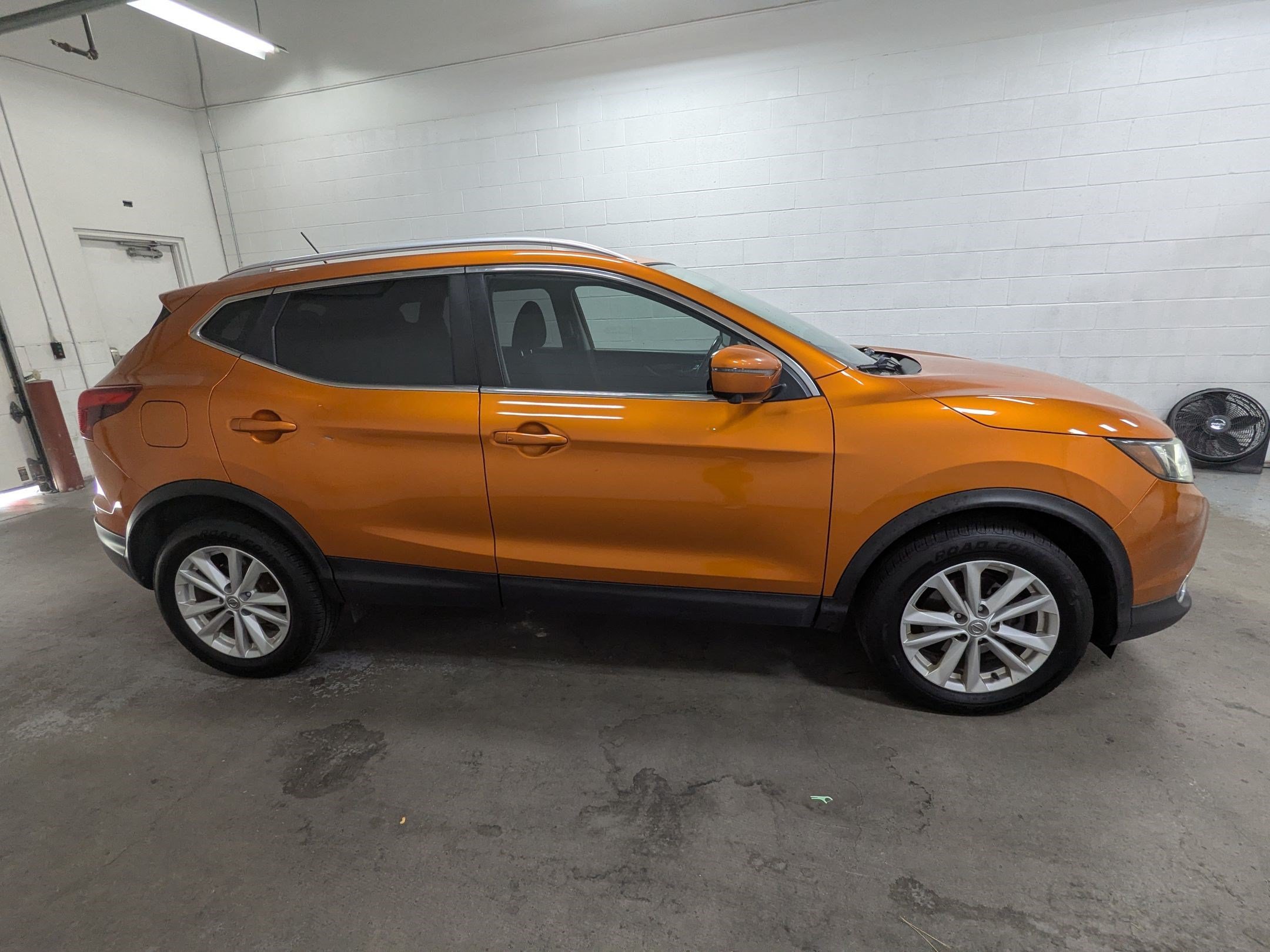 Used 2017 Monarch Orange Nissan SV image 3