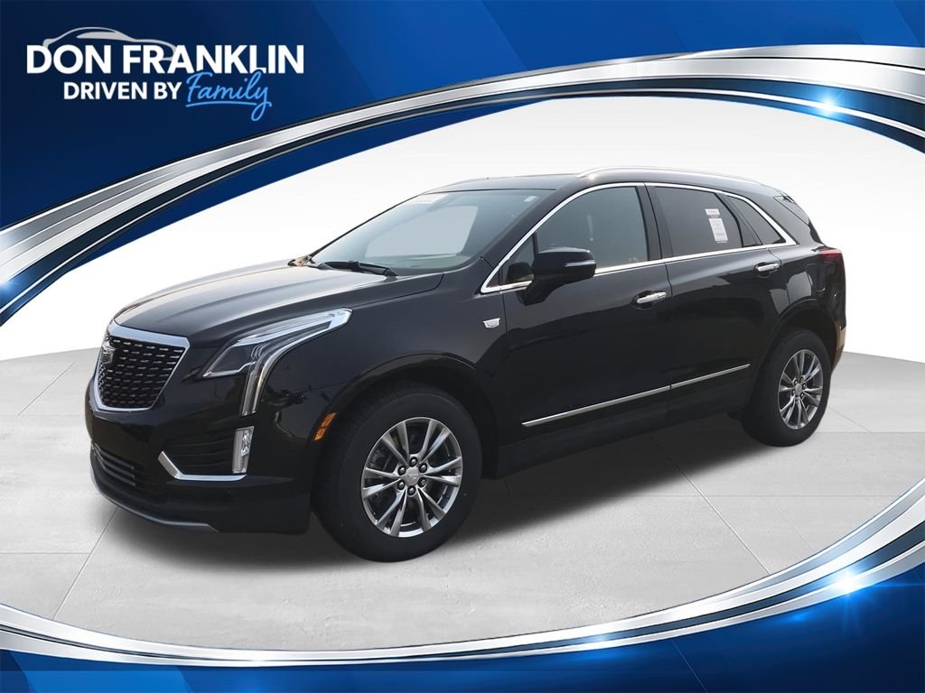 Used 2022 Black Cadillac Premium Luxury image 1