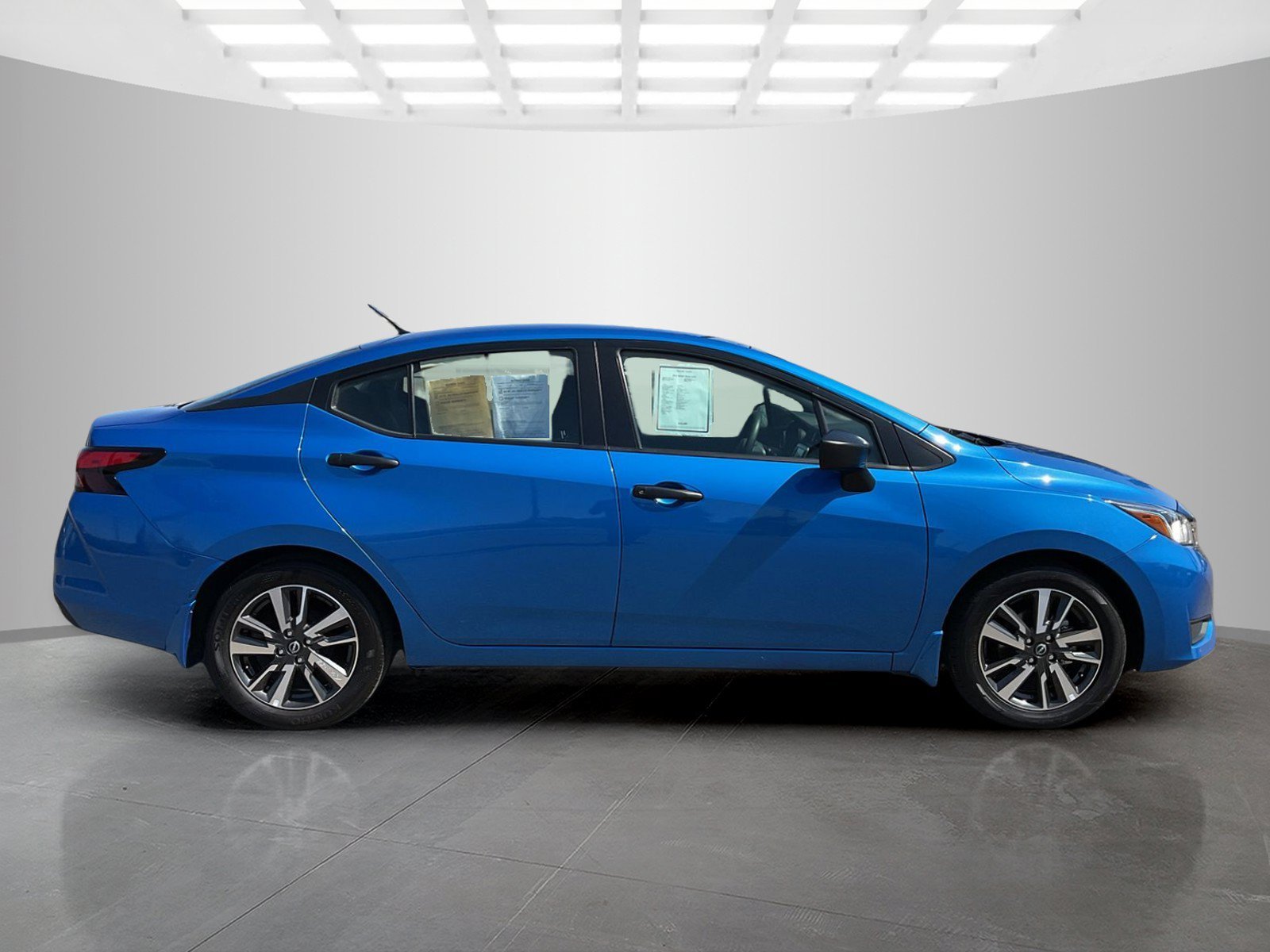 Used 2024 Electric Blue Metallic Nissan S image 2