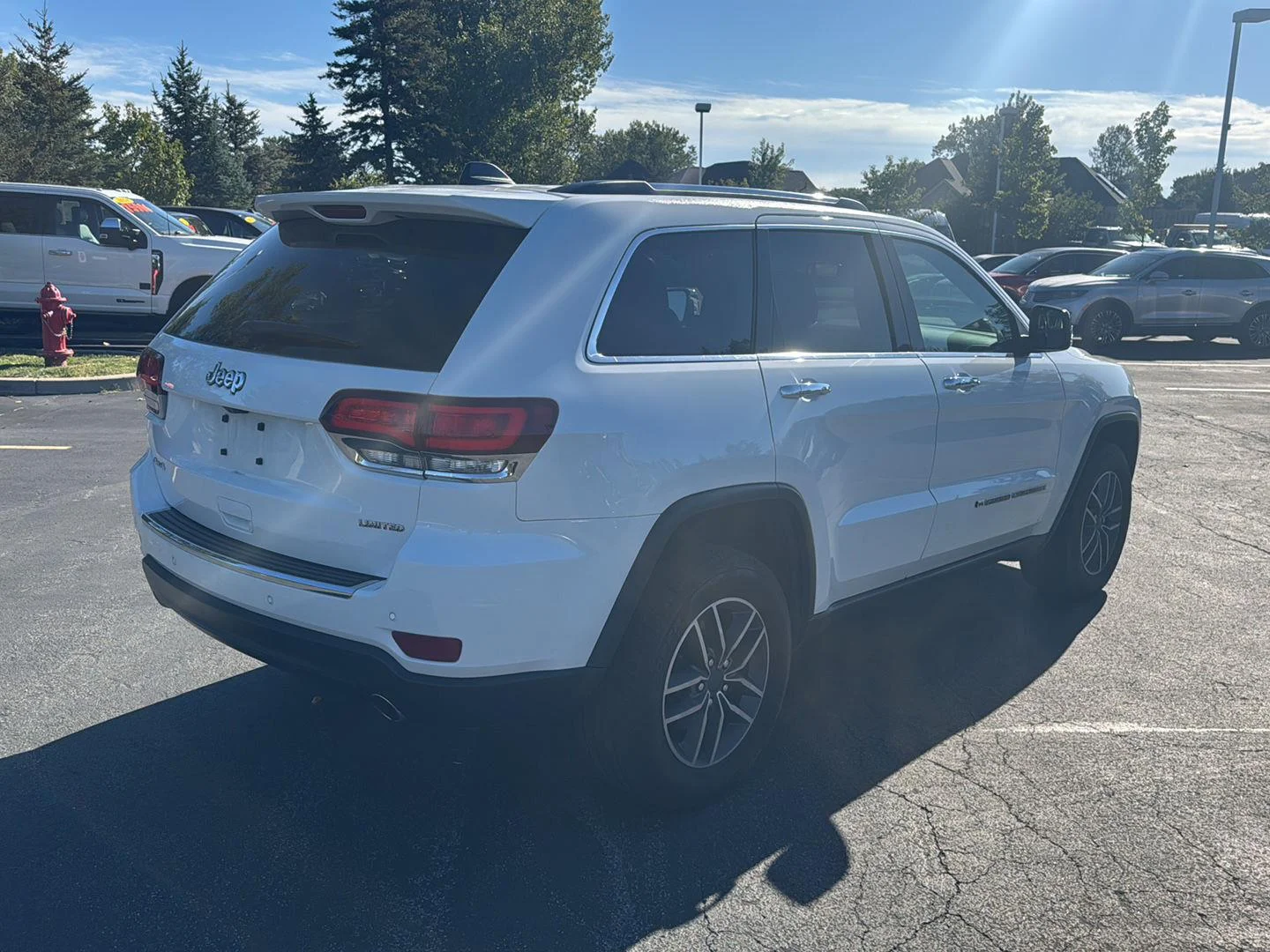 Used 2022 Bright White Clearcoat Jeep Limited image 4