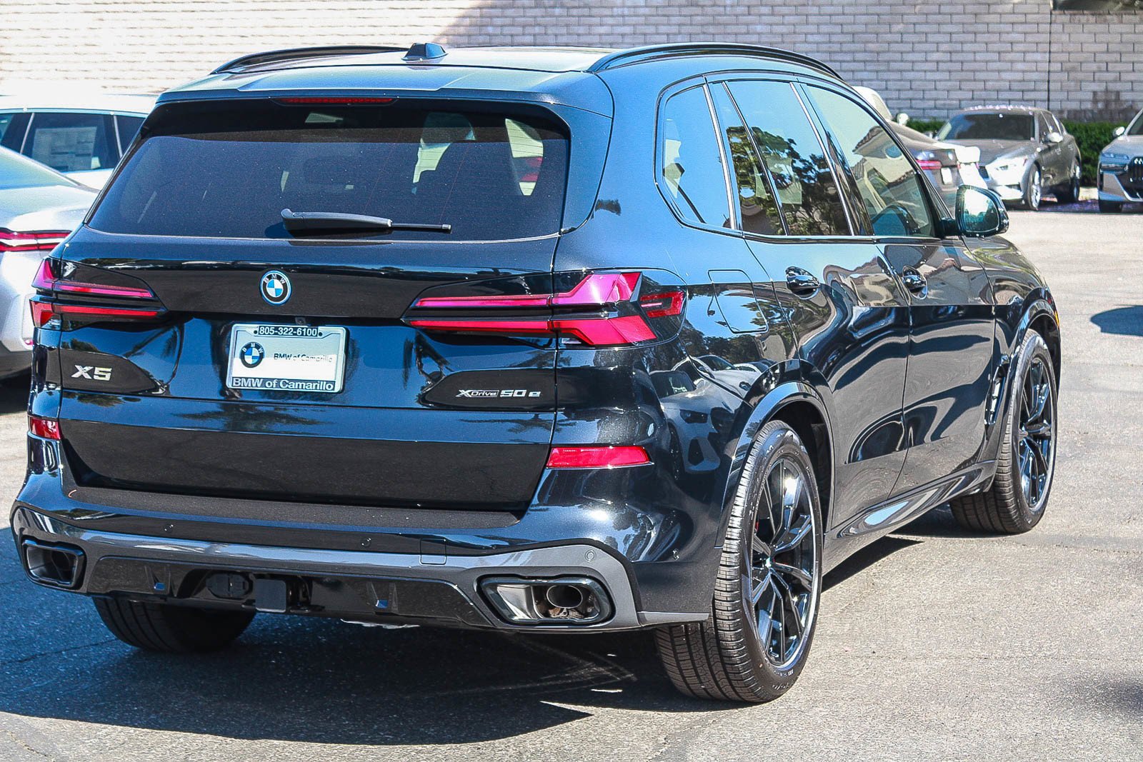 New 2026 Black Sapphire Metallic BMW xDrive50e image 6