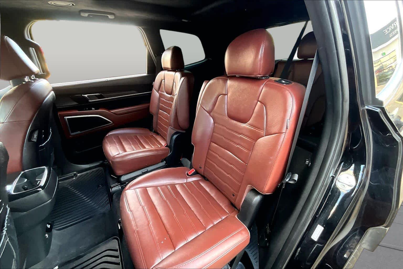 Used 2023 Ebony Black Kia SX Prestige image 21