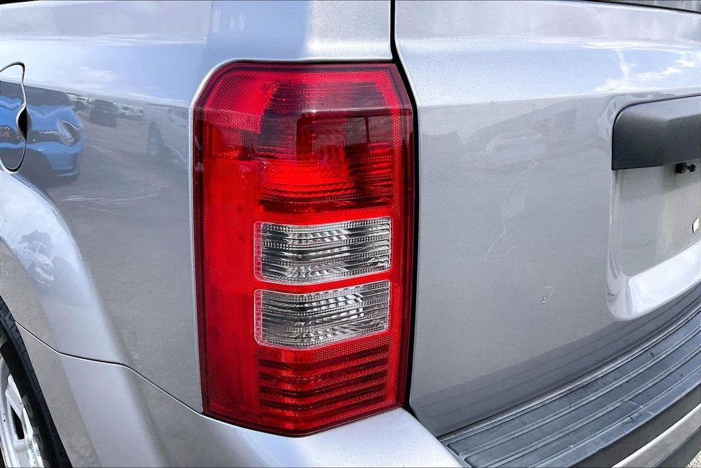 Used 2016 Maximum Steel Metallic Jeep Sport image 19