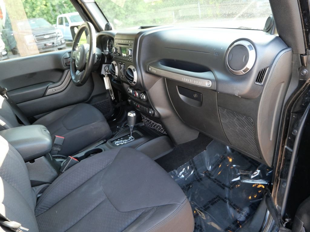 Used 2013 Black Jeep Unlimited Sport image 11