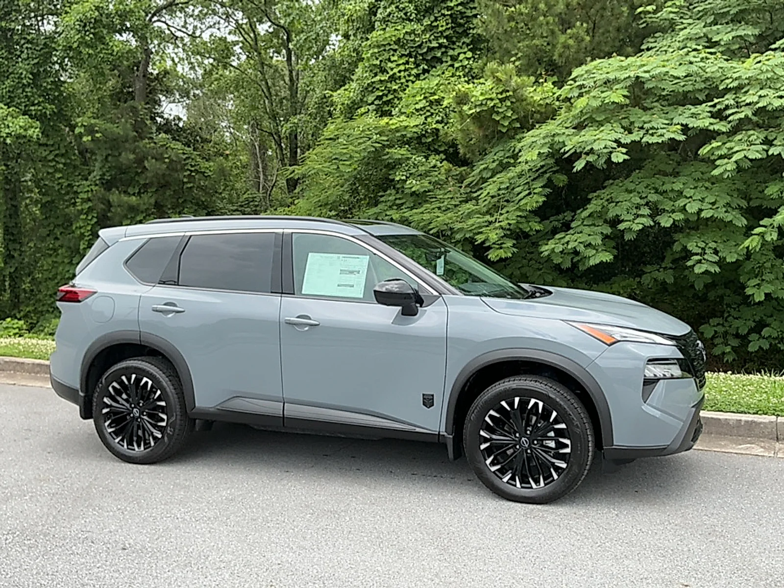 New 2026 Boulder Gray Pearl Nissan Dark Armor image 1