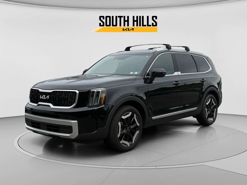 Used 2024 Black Kia EX image 1