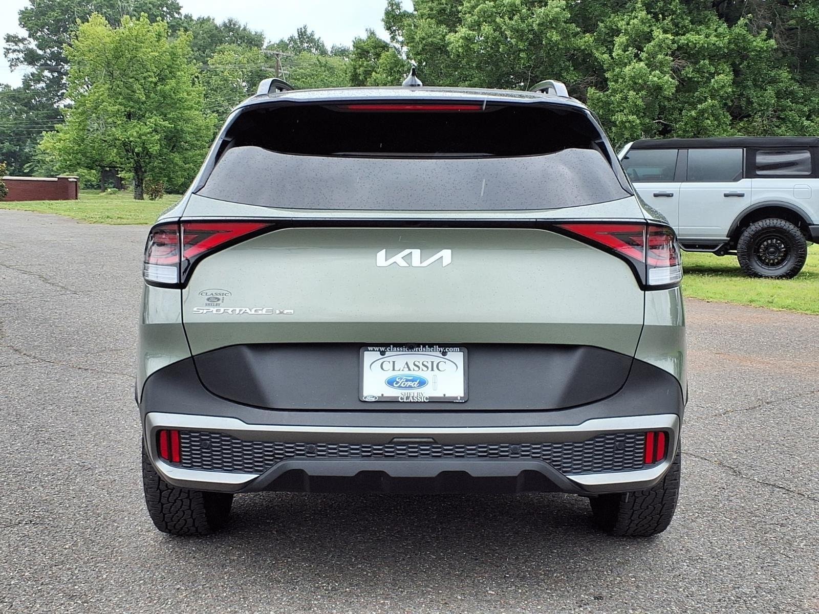 Used 2024 Jungle Green/Ebony Black Roof Kia X-Pro Prestige image 11