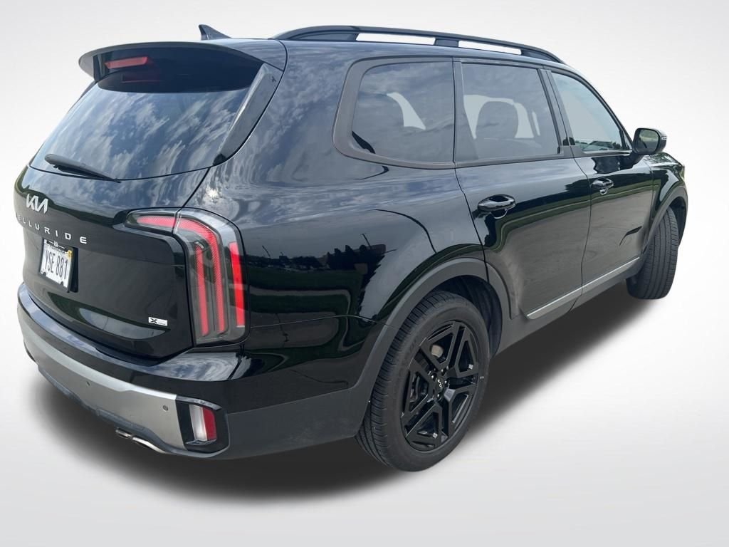 Used 2023 Black Kia EX X-Line image 4