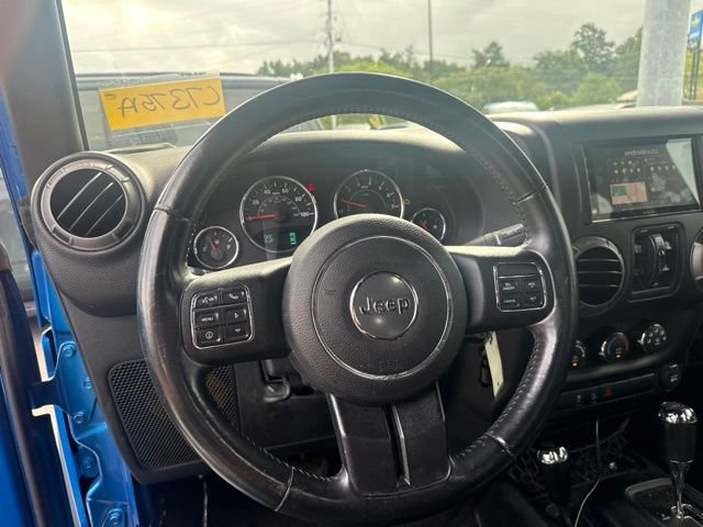 Used 2015 Blue Jeep Unlimited Sport image 12