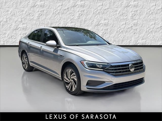 Used 2021 Pyrite Silver Metallic Volkswagen SEL image 1