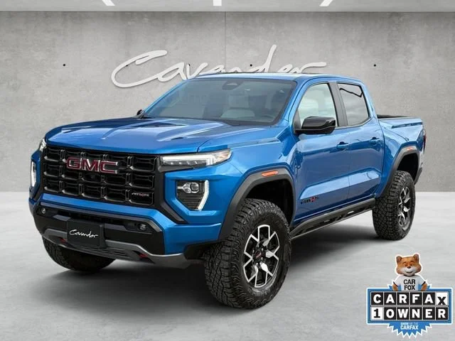 Used 2024 Dynamic Blue Metallic GMC AT4X image 1