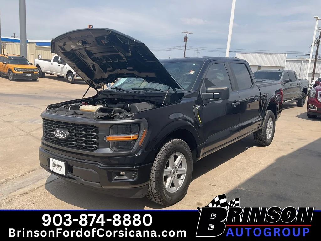 Used 2024 Agate Black Metallic Ford STX image 13