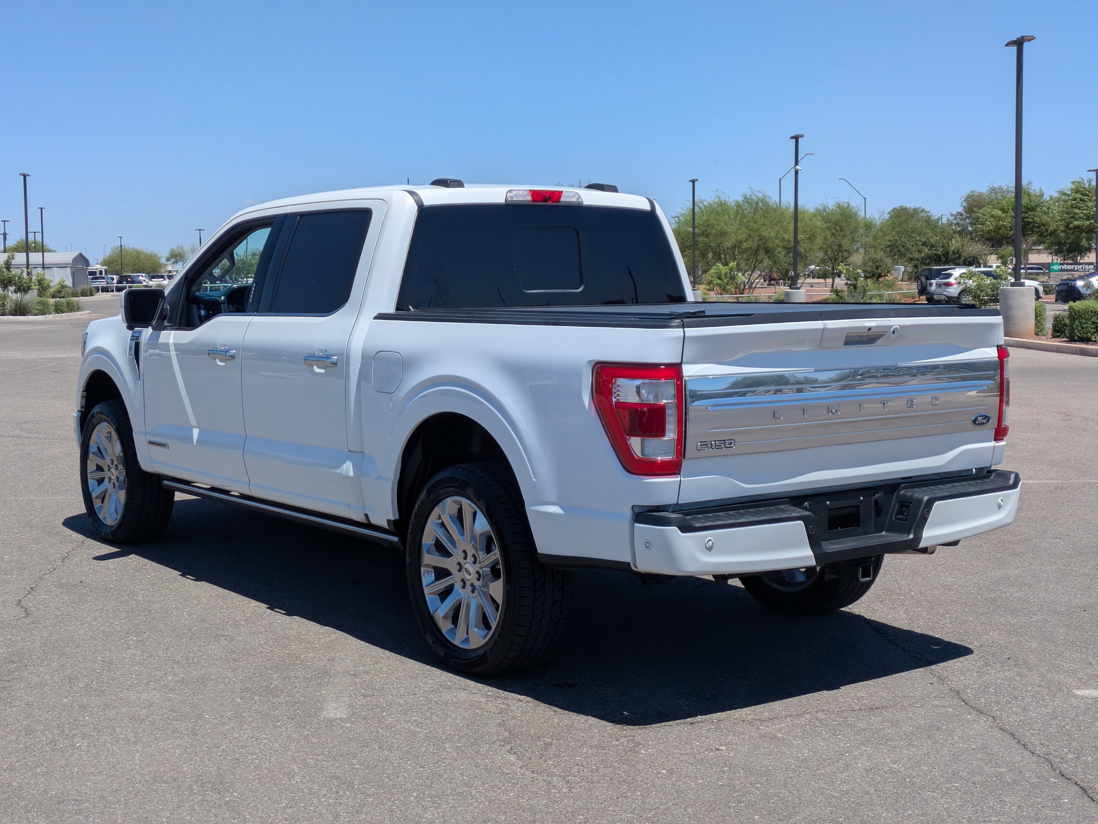 Used 2023 White Metallic Ford Limited image 3