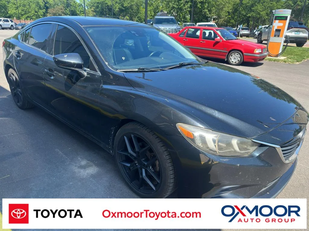2015 Mazda EZ-6 i Touring Auto's photo