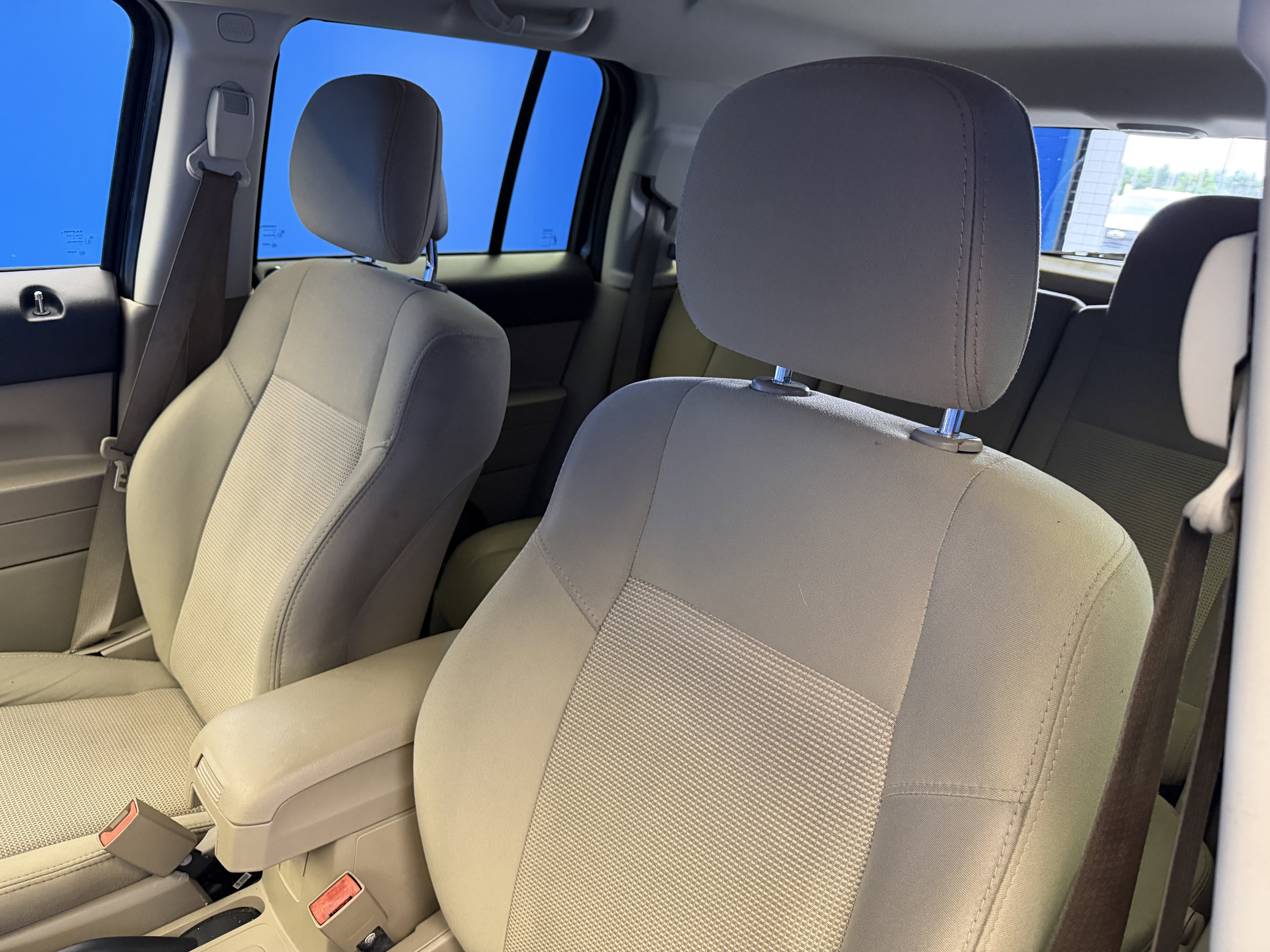 Used 2012 Mineral Gray Metallic Jeep Sport image 11