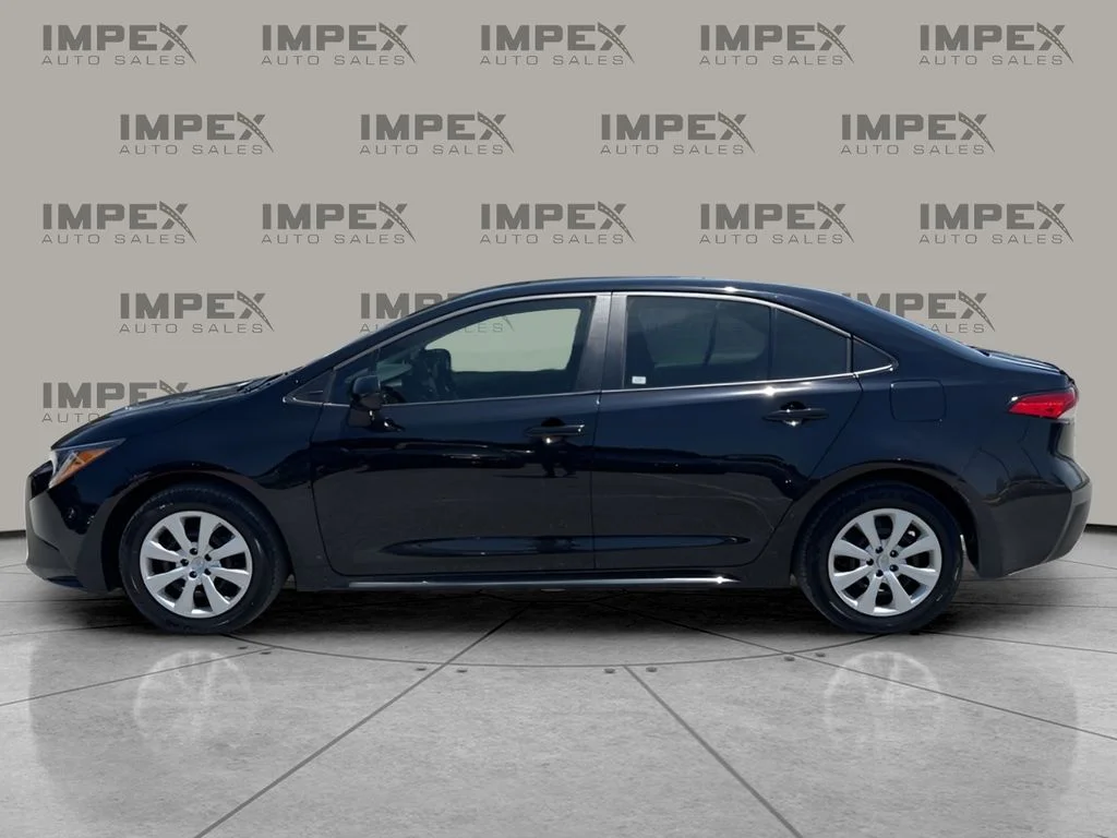 Used 2024 Black Toyota LE image 2