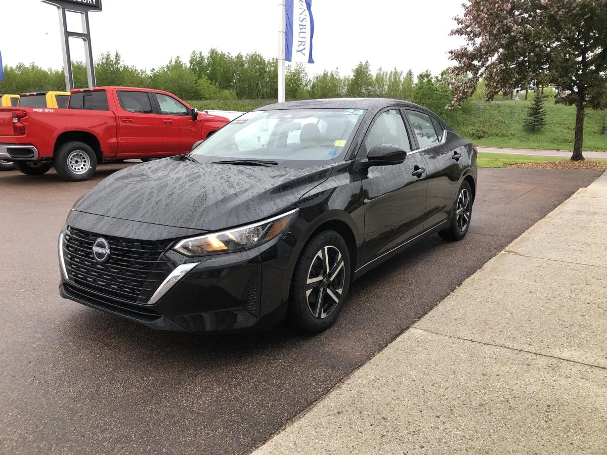 Used 2024 Black Nissan Sv Cvt image 4