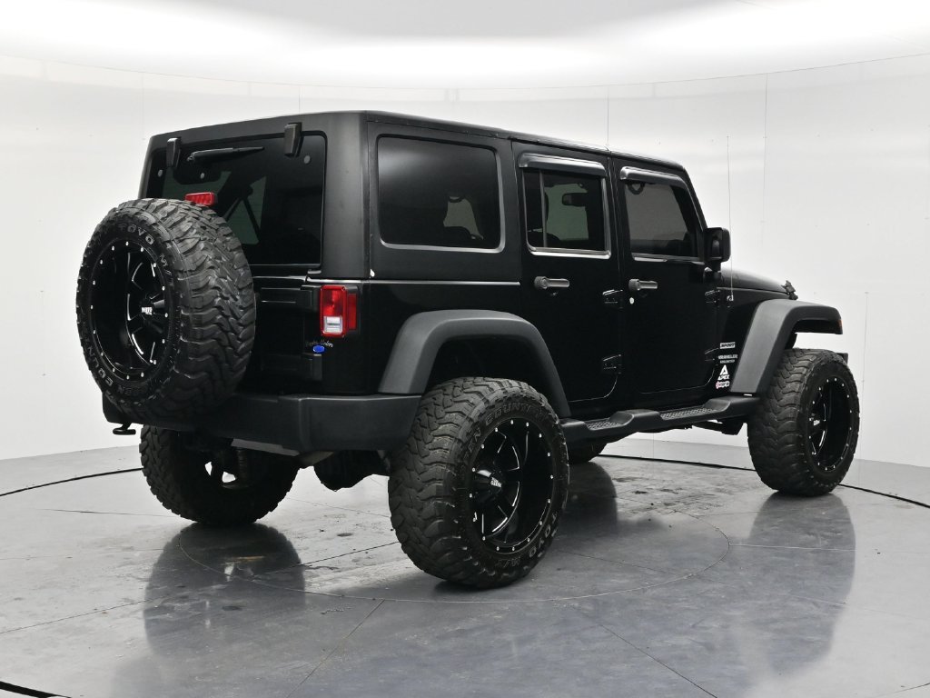 Used 2014 Black Clearcoat Jeep Unlimited Sport image 5