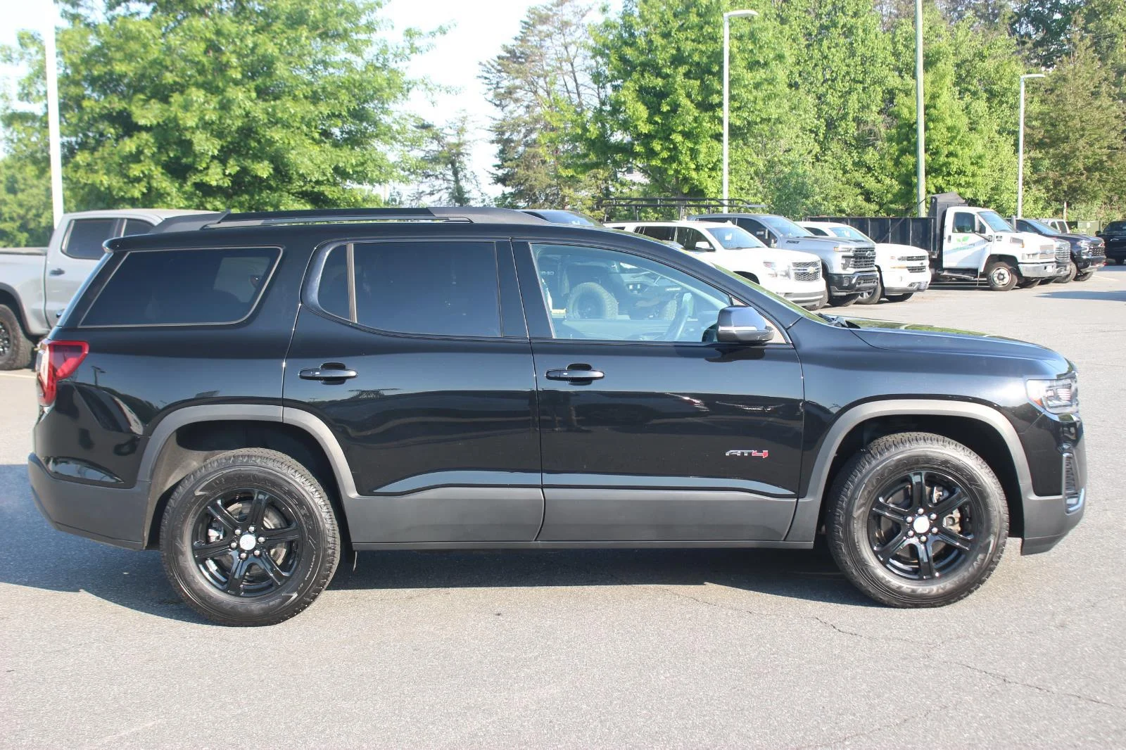 Used 2023 Ebony Twilight Metallic GMC AT4 image 8