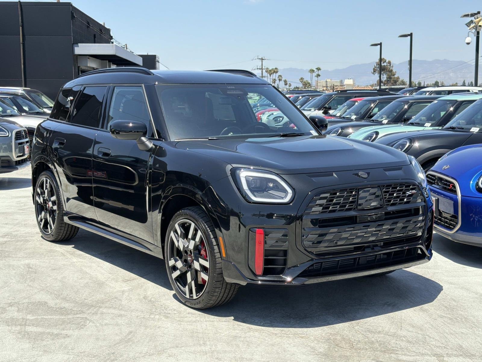 New 2027 0C4R Midnight Black II Metallic MINI Iconic image 2