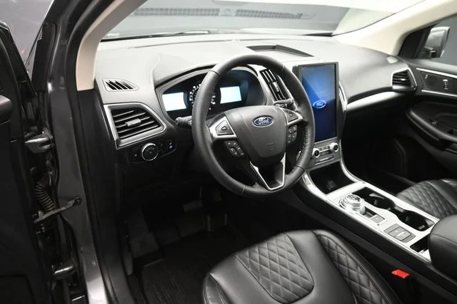Certified Used 2024 Carbonized Gray Metallic Ford Titanium image 9