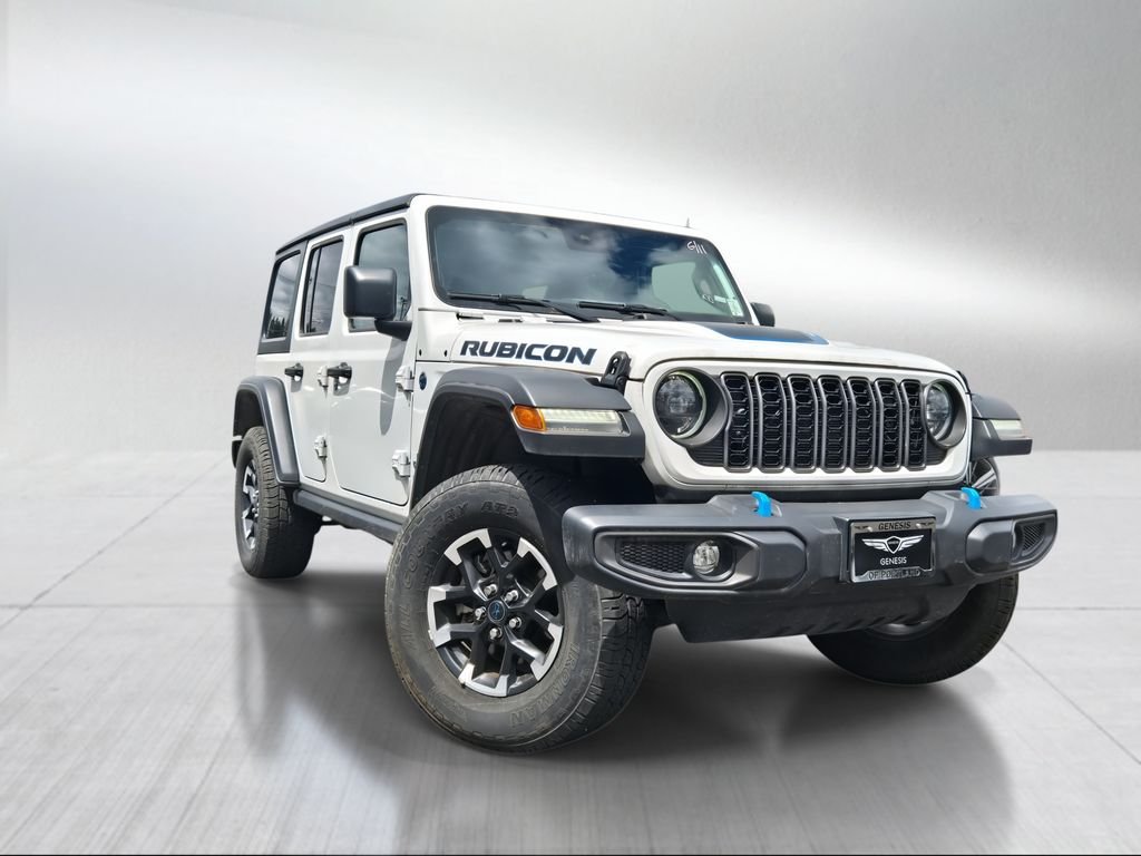 Used 2024 Bright White Clearcoat Jeep Rubicon 4xe image 1