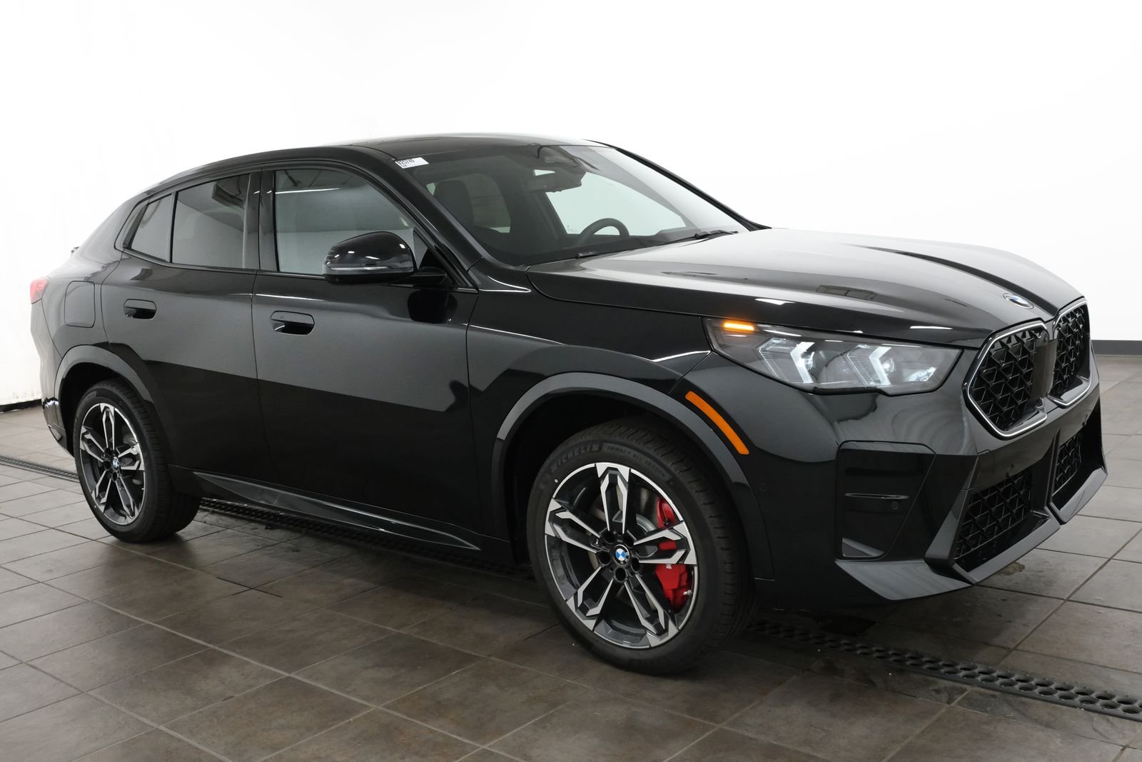New 2026 Black Sapphire Metallic BMW xDrive28i image 7