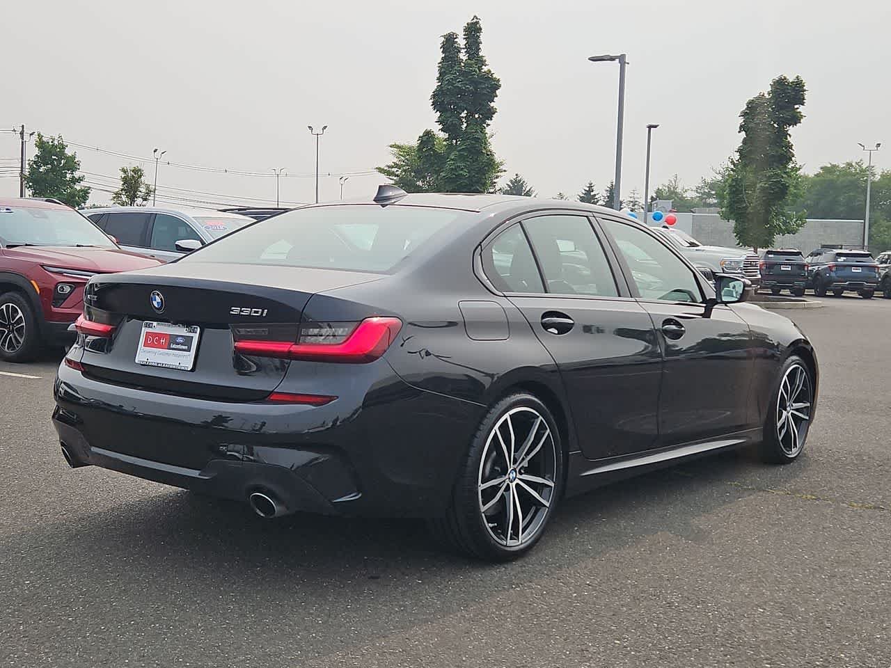 Used 2021 Black Sapphire Metallic BMW 330i xDrive image 31