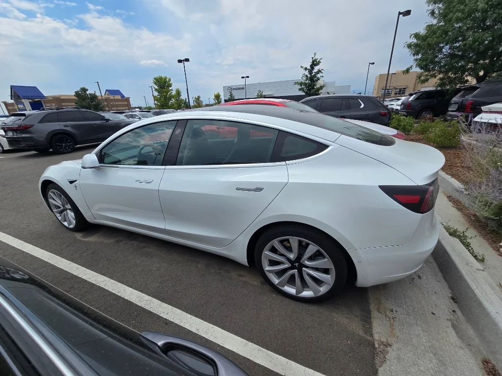 Used 2019 Tesla Model 3 Mid Range with VIN 5YJ3E1EA4KF417602 for sale in Yuma, CO
