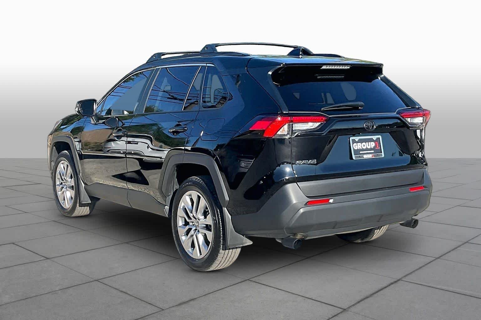 Used 2025 Midnight Black Metallic Toyota XLE Premium image 12