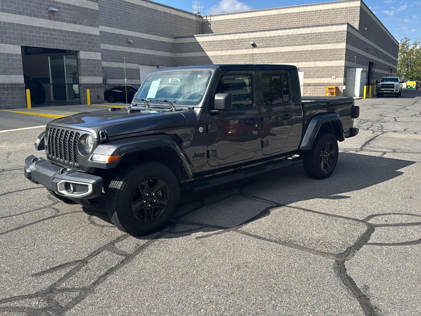 Used 2021 Granite Crystal Metallic Clearcoat Jeep Sport S image 3