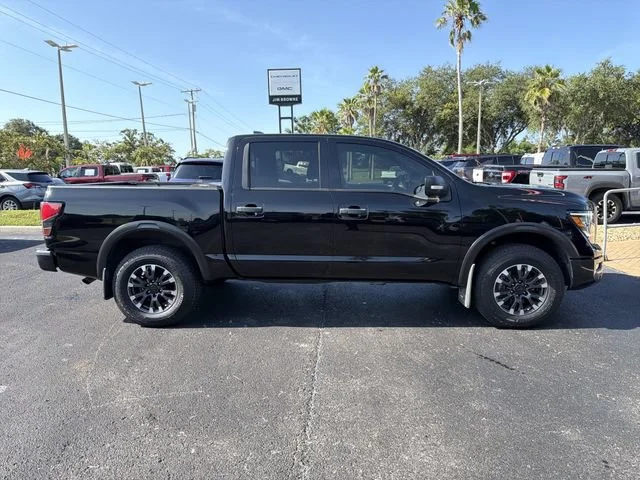 Used 2022 Black Nissan Crew Cab PRO-4X 4x4 image 2