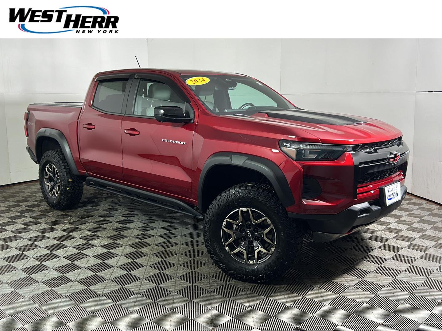 Used 2024 Radiant Red Tintcoat Chevrolet 4WD ZR2 image 1