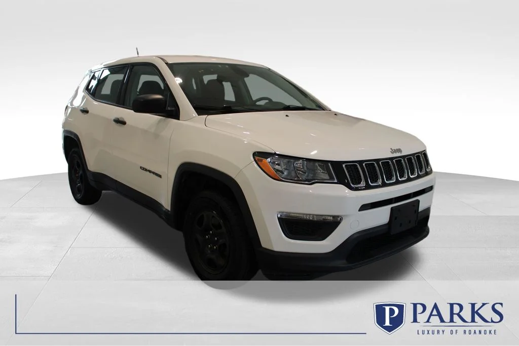 Used 2017 White Jeep Sport image 1