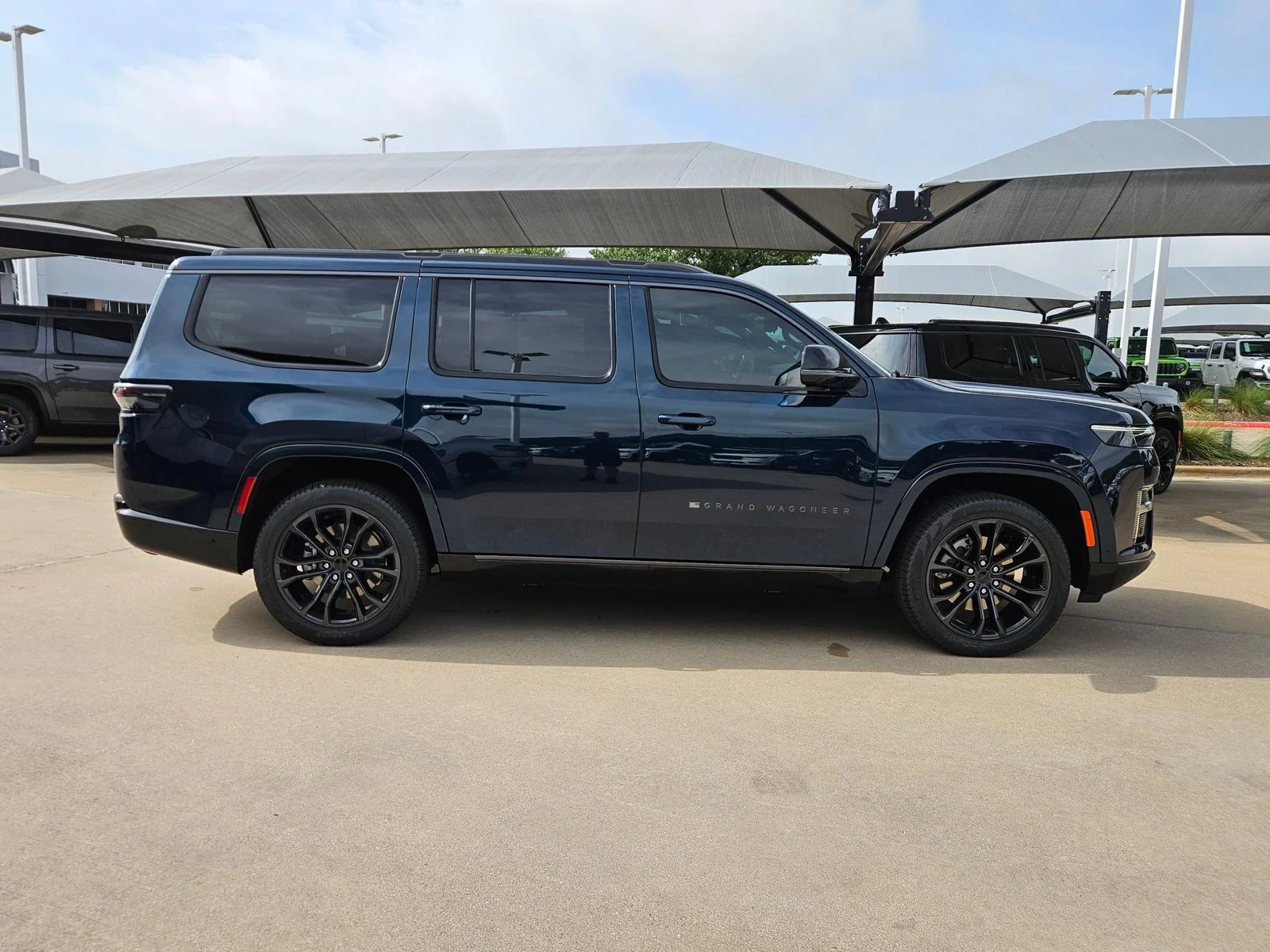 New 2026 Fathom Blue Pearlcoat Jeep Summit Obsidian image 7