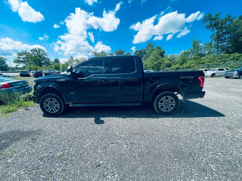 Used 2015 Ford F-150 XLT with VIN 1FTEW1EP2FFA05352 for sale in Howell, MI