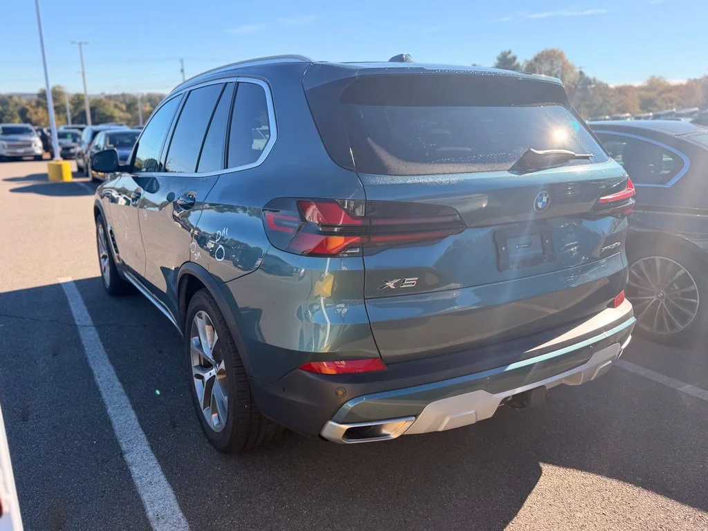 Certified Used 2025 Blue BMW xDrive50e image 3
